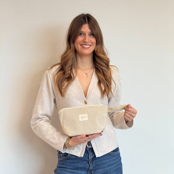 Model with the DE LA MUR Striped Jacquard Large Makeup Bag – Olive & Cream (Foz)