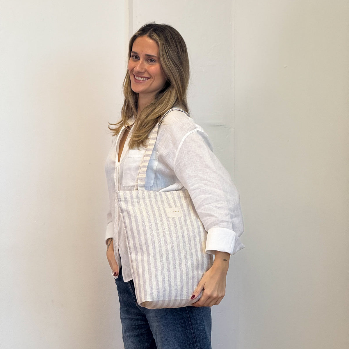 Model with the DE LA MUR Striped Medium Zippered Tote Bag – Lilac & Gold (Lulil)