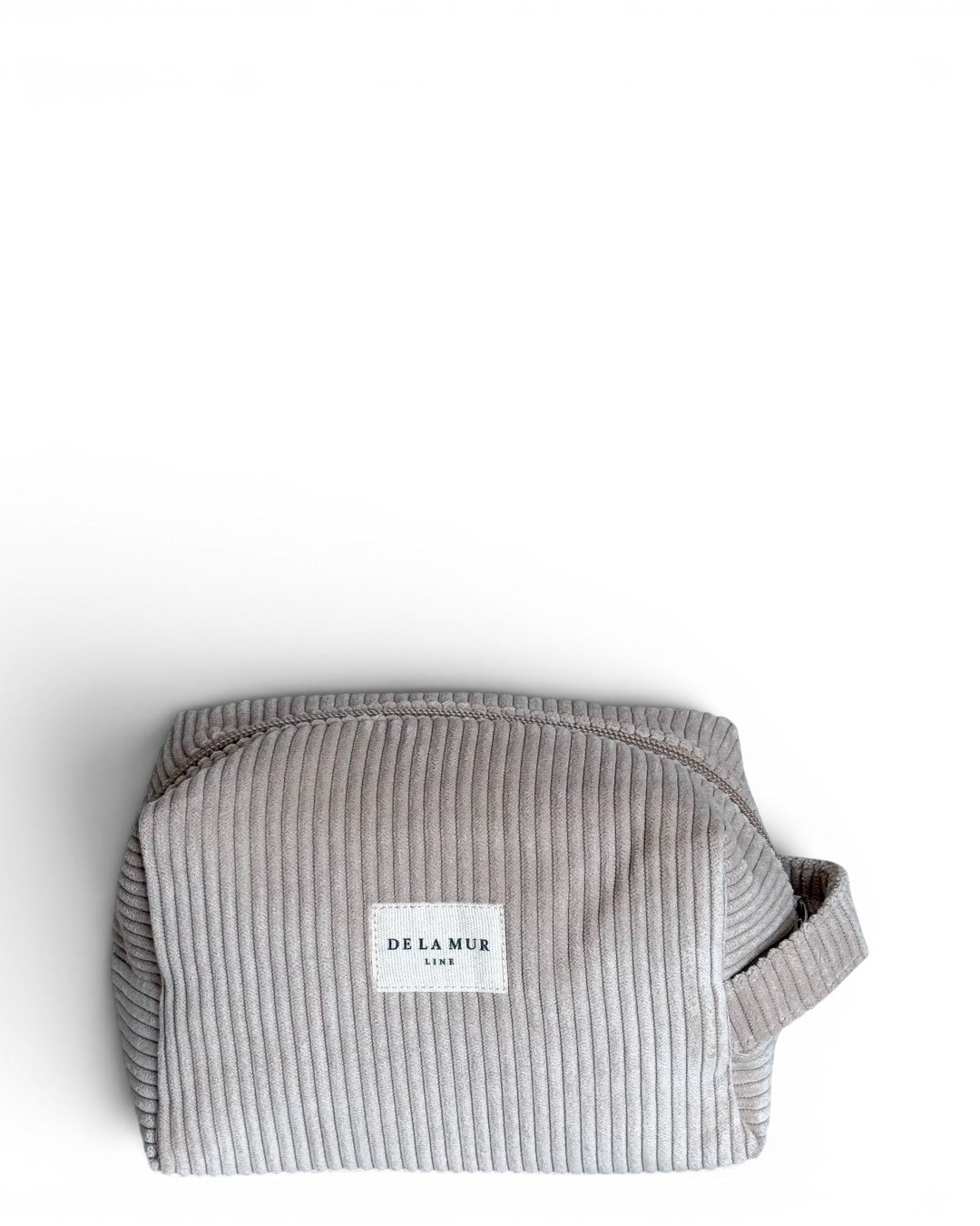 DE LA MUR corduroy squared makeup bag in beige, front view with Line label
