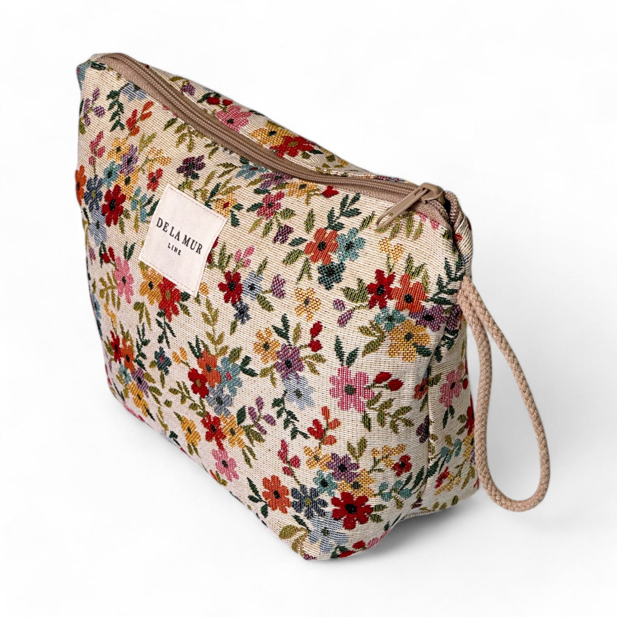 DE LA MUR floral jacquard large makeup bag, three-quarter view with side strap