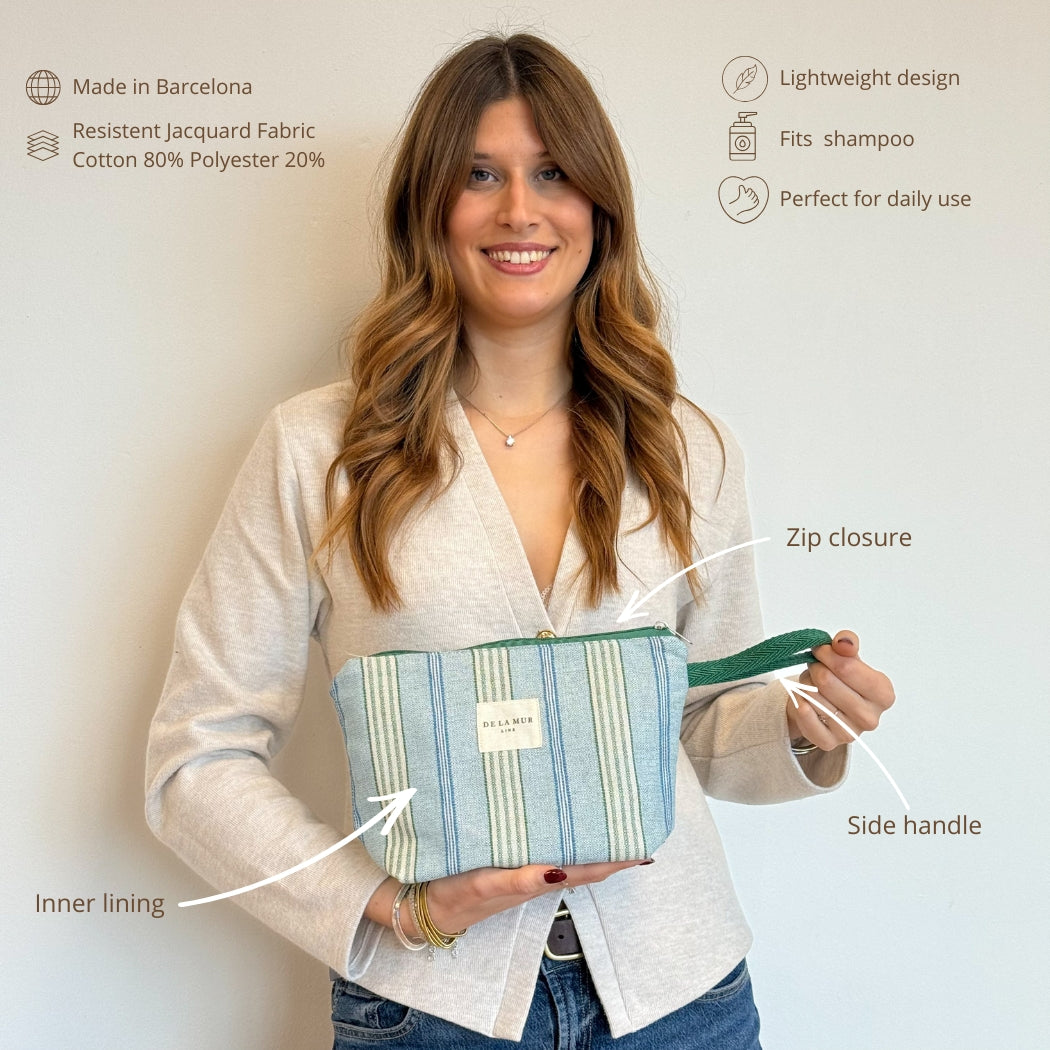Model holding the DE LA MUR Cata makeup bag with labeled features infographic