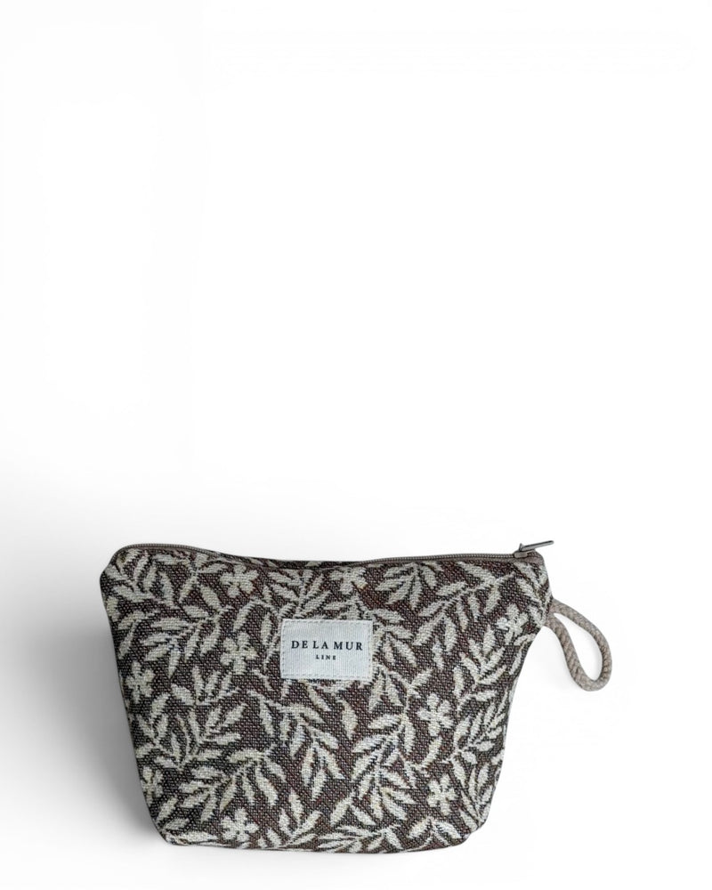 DE LA MUR Plan floral jacquard small makeup bag in beige and cream, front view with wrist loop