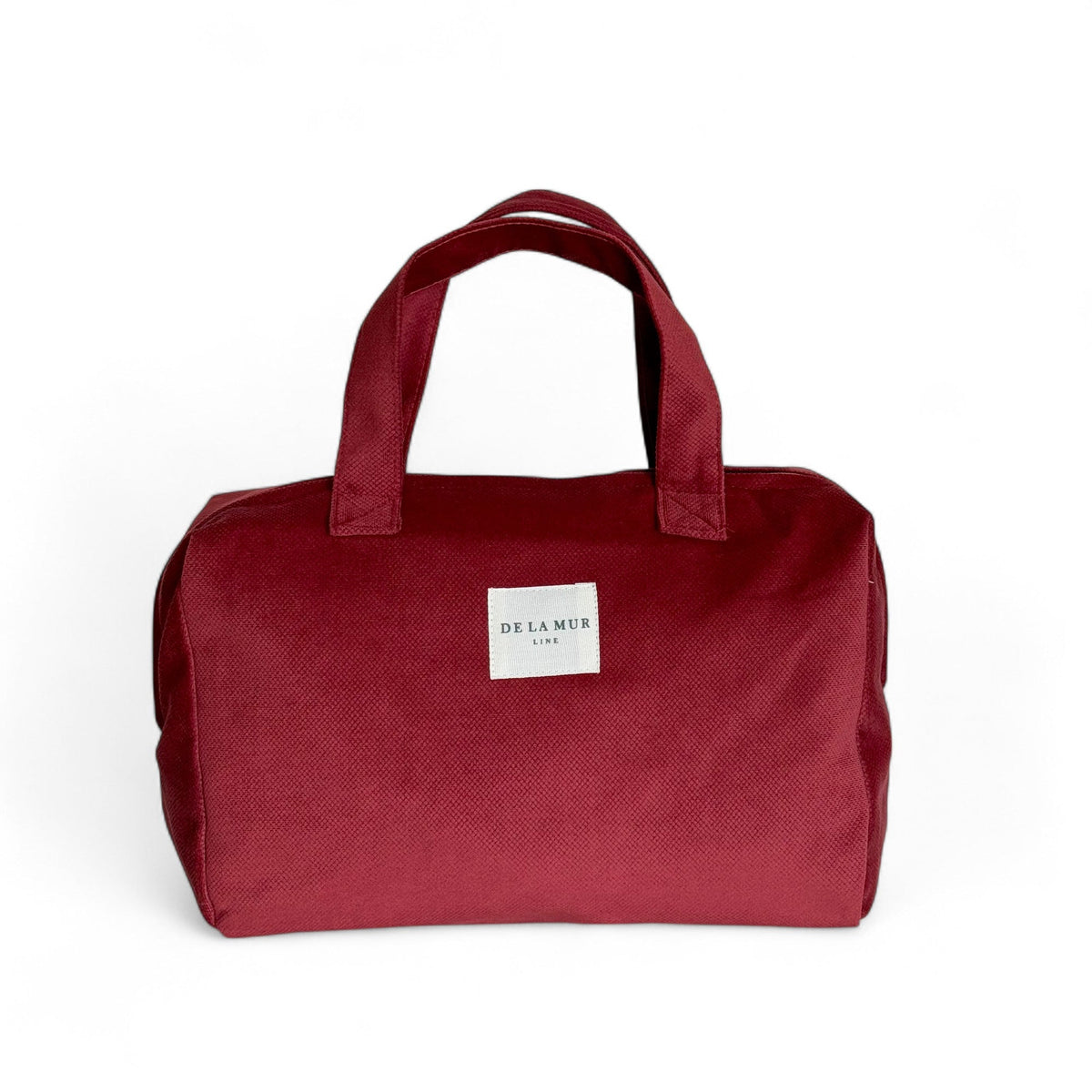 DE LA MUR Bore XL makeup bag in burgundy, front view with top handles