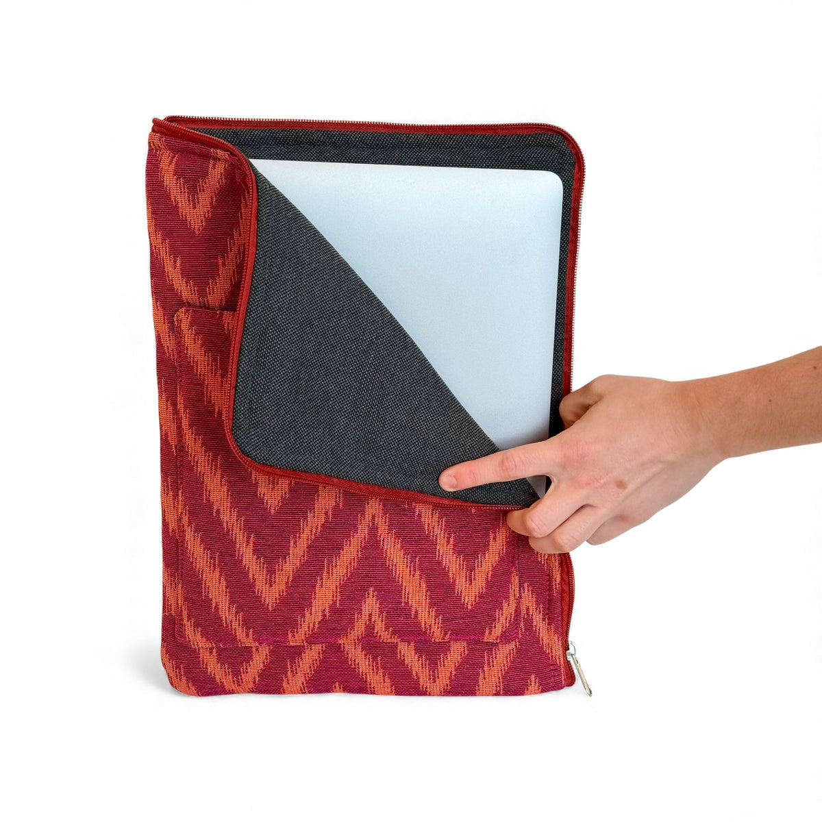 DE LA MUR Fuego laptop bag open showing padded sleeve with a laptop inside