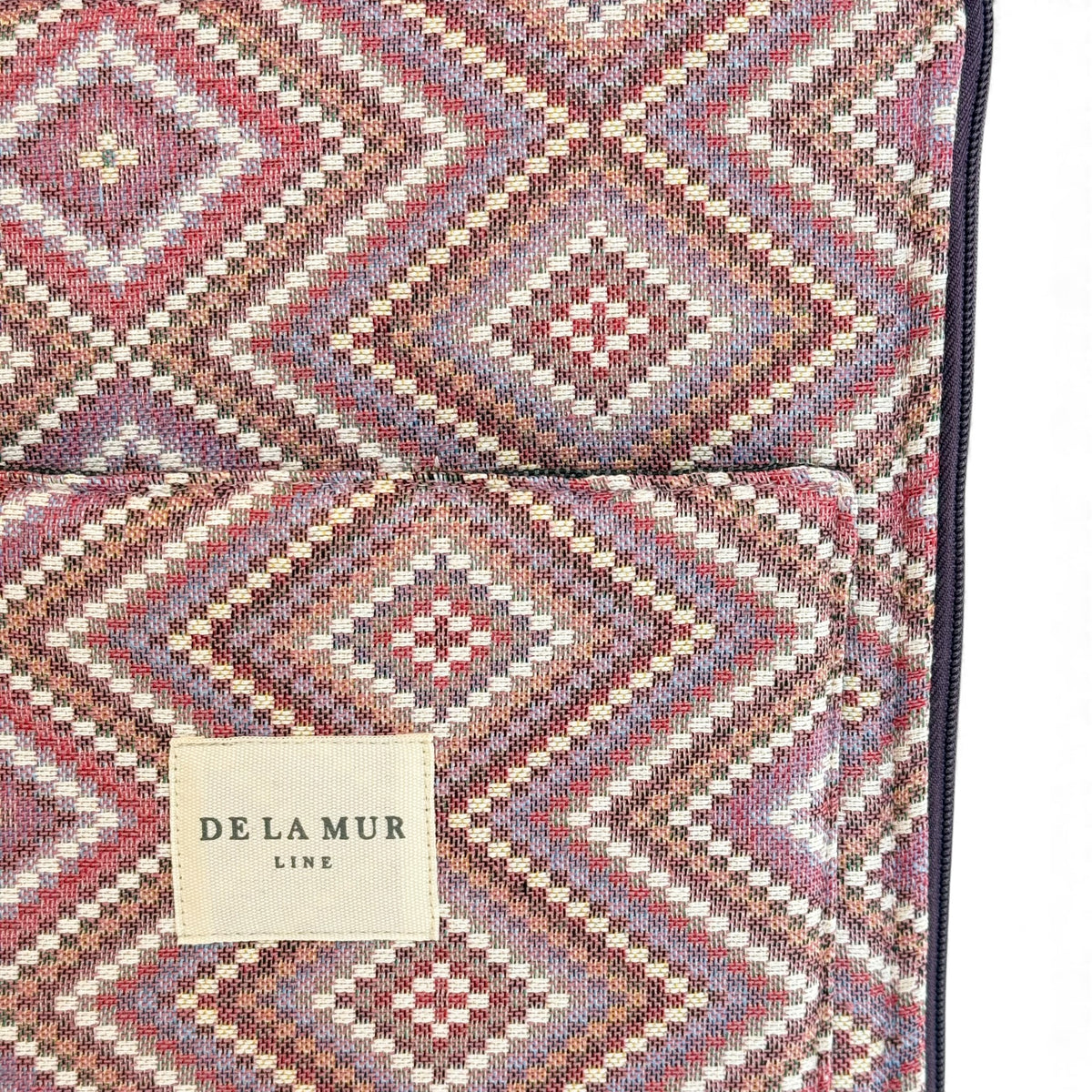 Back view of the DE LA MUR pink lilac geometric laptop bag with Line label