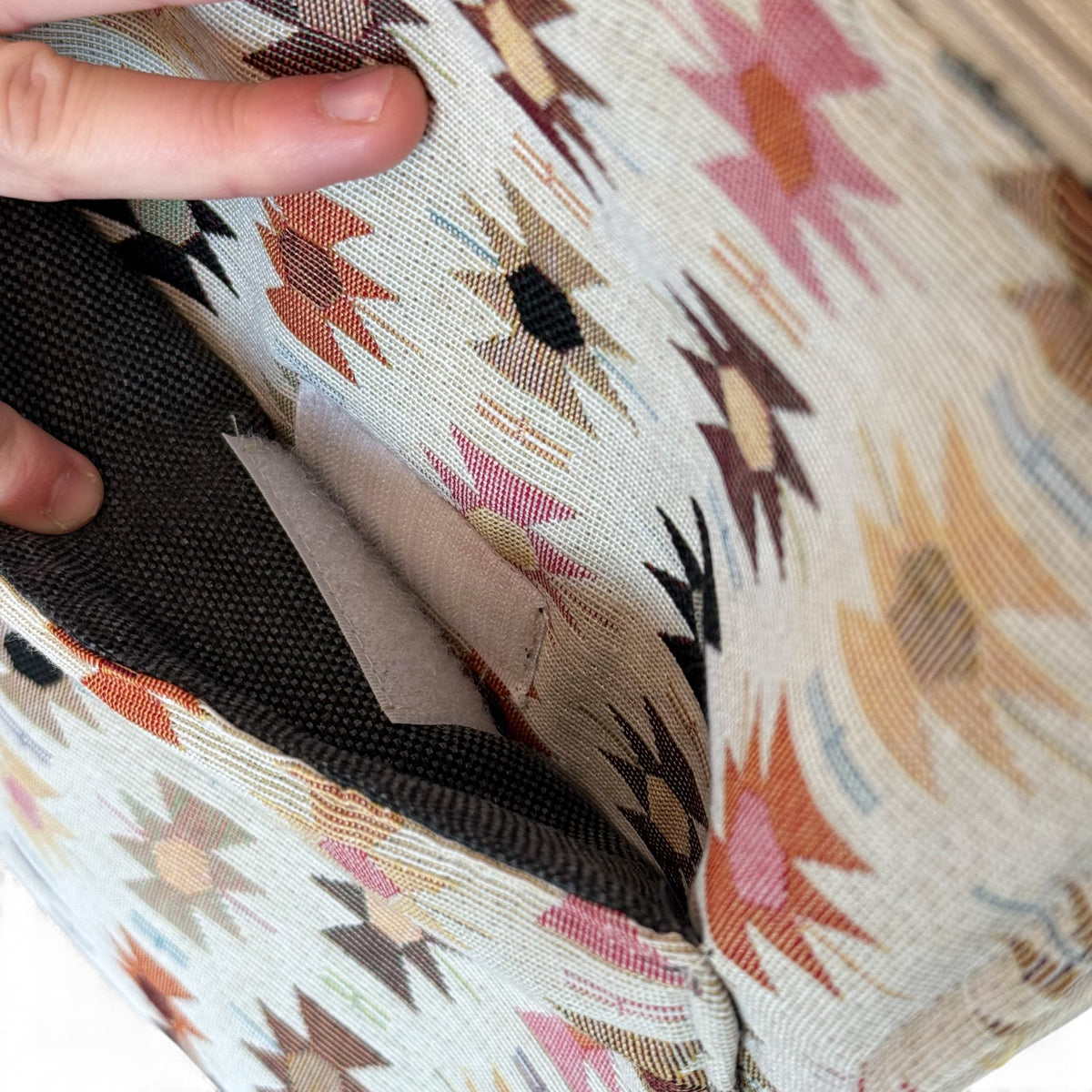 Close-up of the velcro exterior pocket inside the DE LA MUR Royal laptop bag