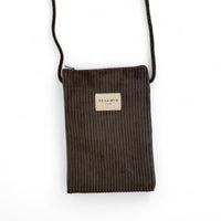 DE LA MUR Boni corduroy phone sleeve in brown with crossbody cord, front view