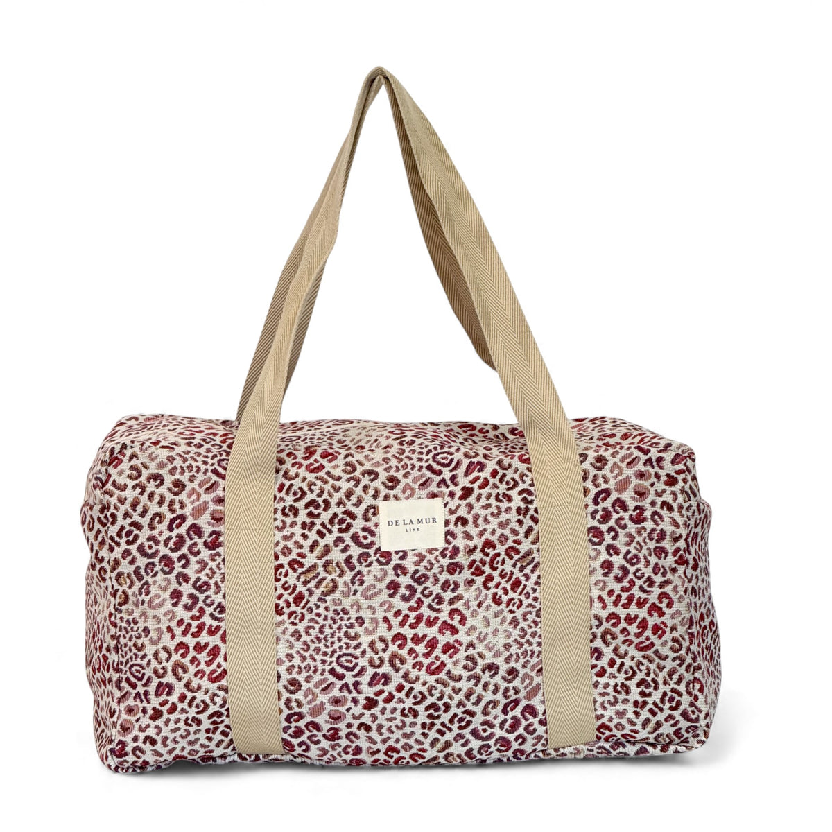DE LA MUR leopard print jacquard sports bag in talco, front view with shoulder straps