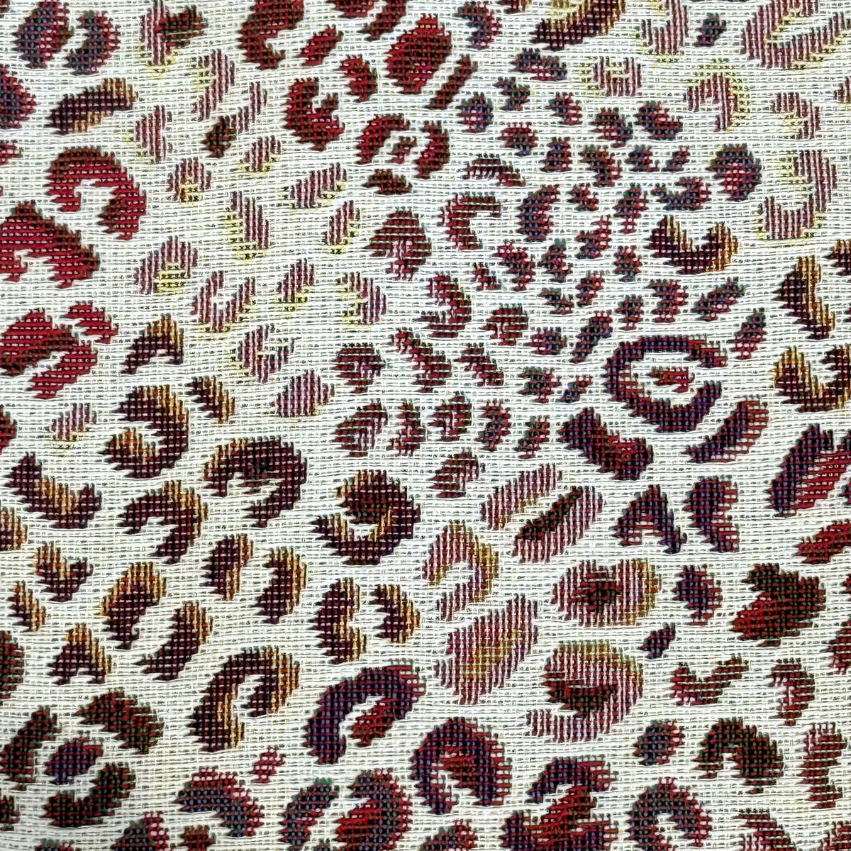 Close-up of the woven leopard print jacquard fabric, DE LA MUR coin purse