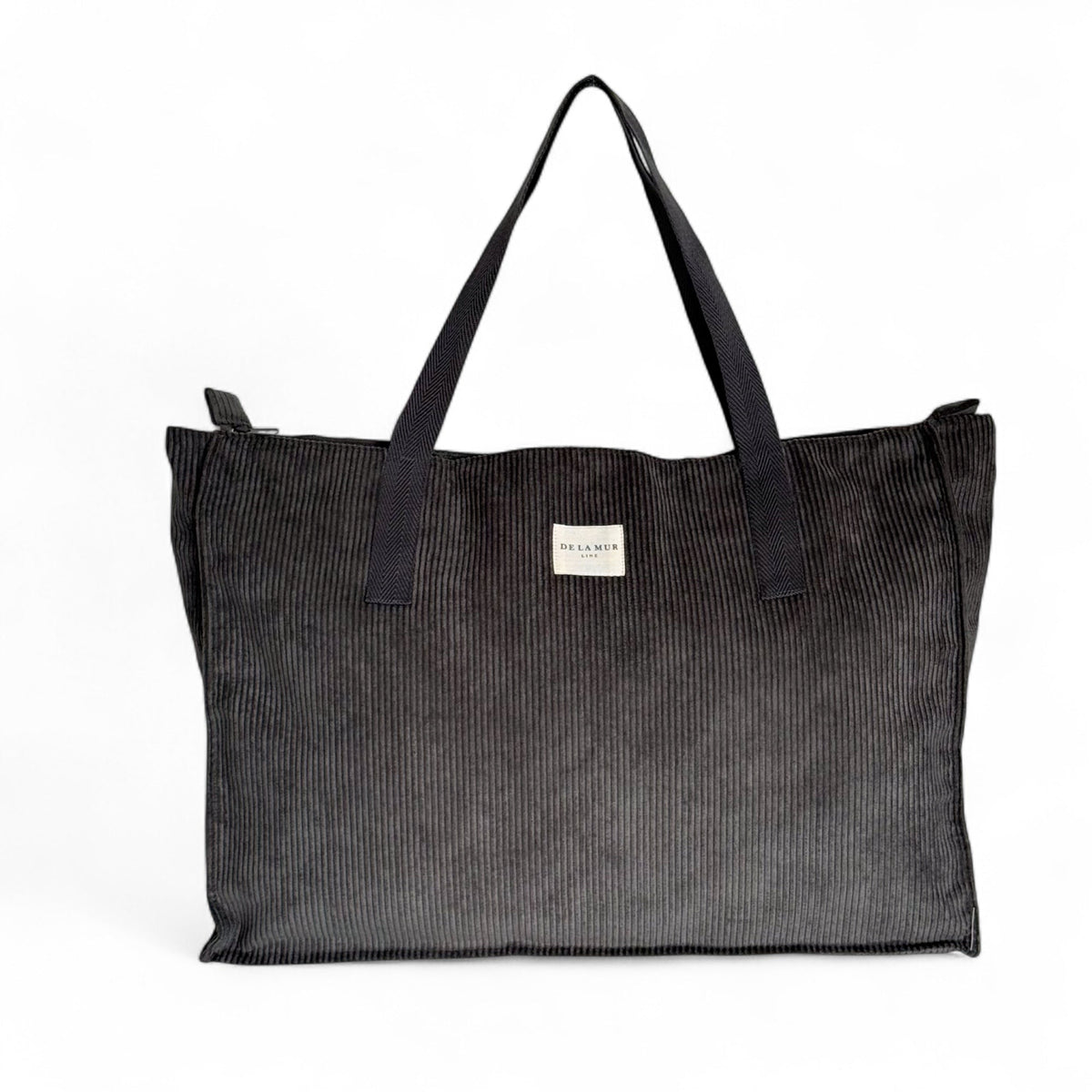 DE LA MUR Boni herringbone corduroy weekender bag in gray, front view with top handles