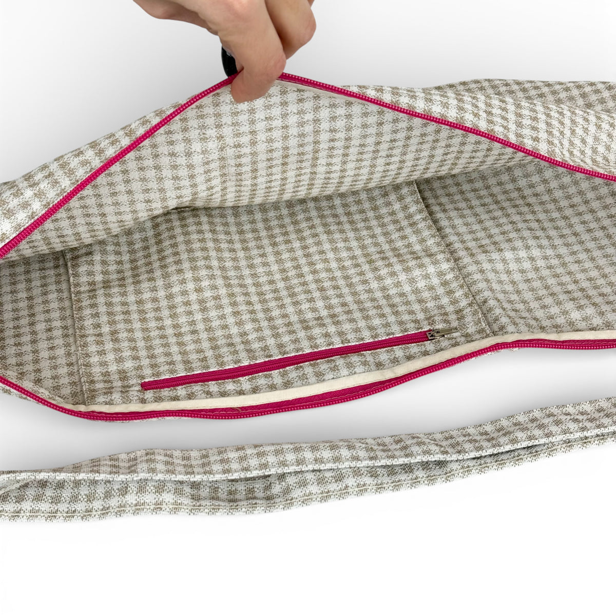 Open DE LA MUR Vison yoga mat bag showing lined interior and inner zip pocket
